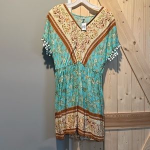 Beautiful dress. New with tags. Size medium.